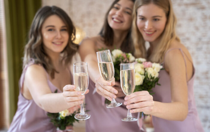 Bridesmaids drinking champagne. From Ceremony to Champagne